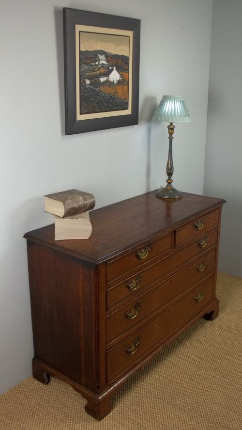 A £750 Georgian 18th Century Oak and Walnut Cross Banded Chest of Drawers of Small Dresser Base Size