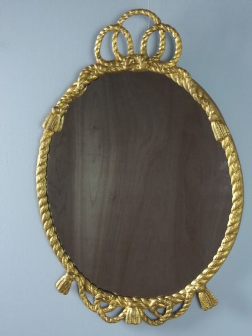 A Victorian 19th Century English Gilded Oval Rope Twist Gilt Wood Wall Mirror.c.1880.