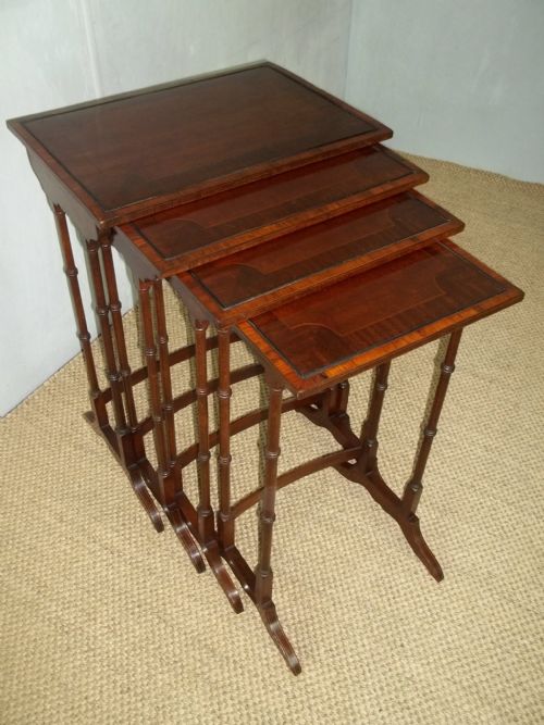 A Late 19th/early 20th Century Set of Mahogany Inlaid Quartetto Nest of Four Stacking Coffee Side Wine Sofa Tables