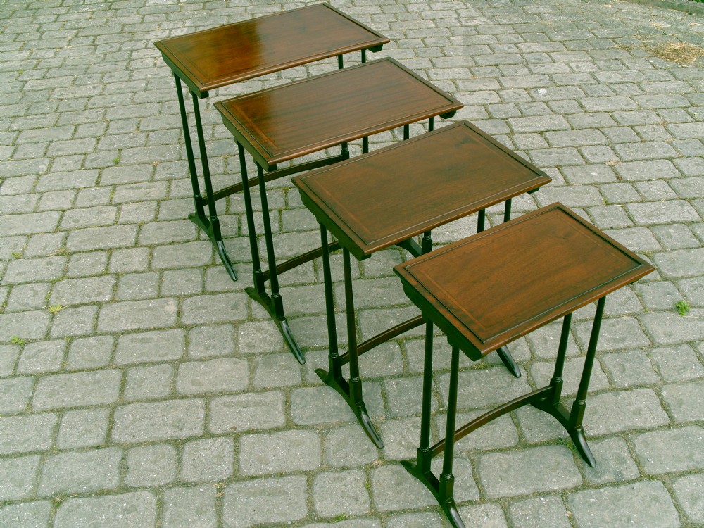 Antique set of four mahogany tables