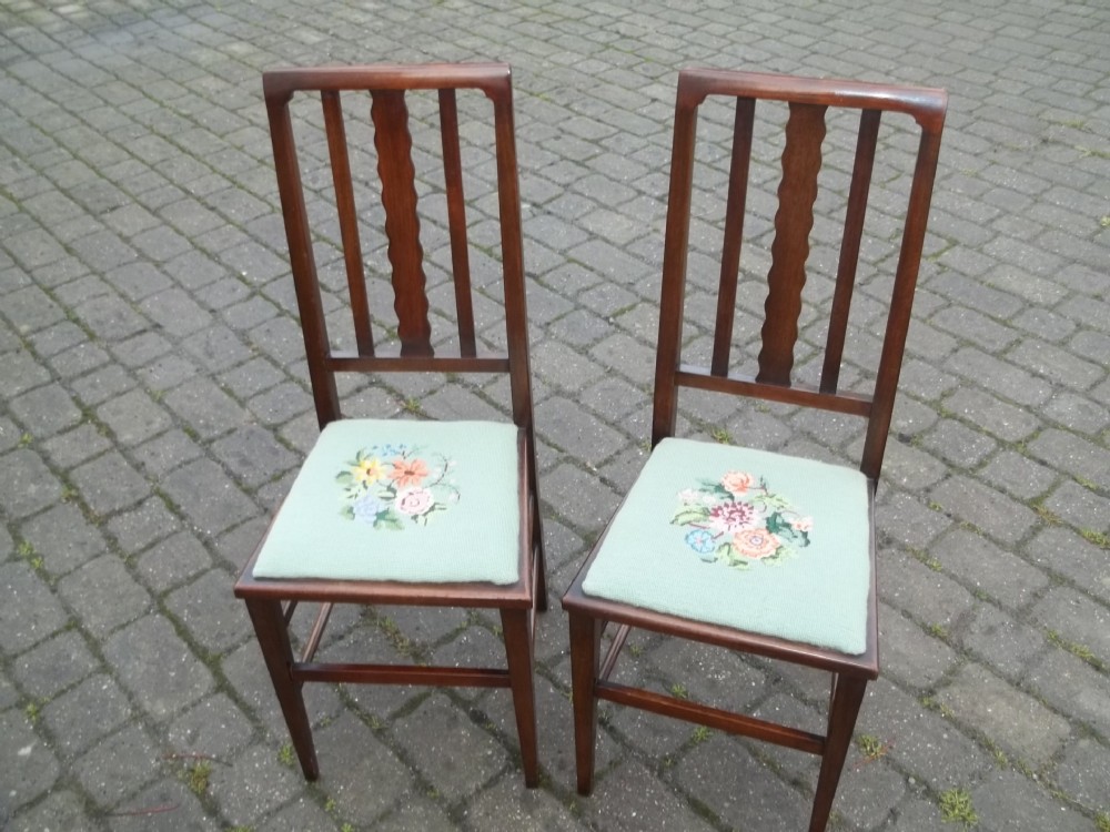 Antique pair of tapestry upholstered bedroom hall side occasional desk chairs.