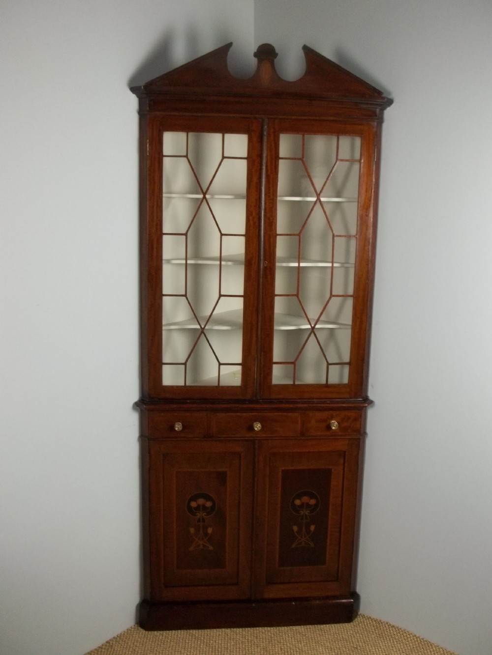 An £1195 Art Nouveau mahogany inlaid standing double height corner display glazed two part cabinet cupboard. C.1890.