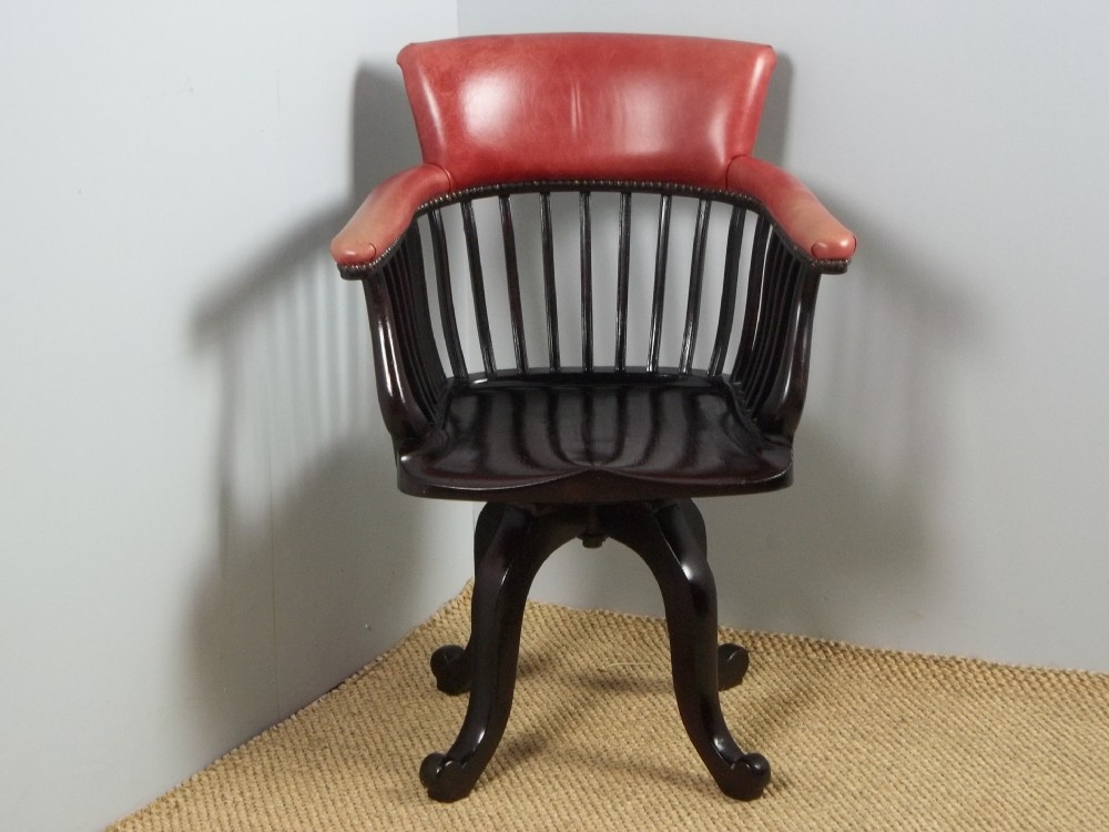 A 19th century mahogany and leather upholstered captains swivel revolving office desk arm chair.
C.1880.