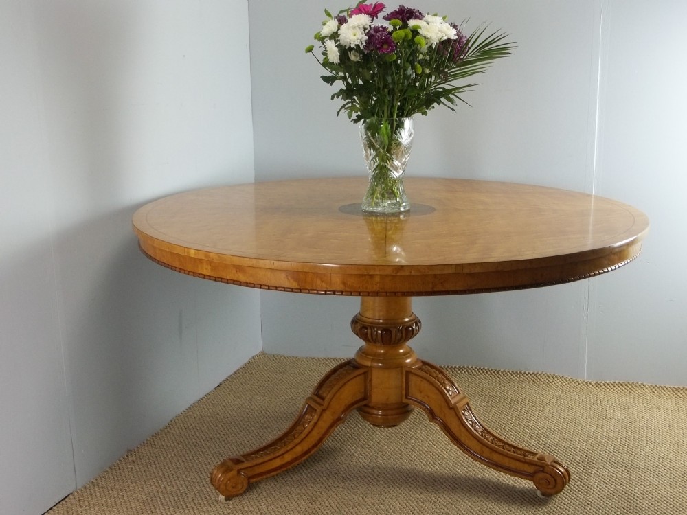 A fine and rare antique Georgian Regency circular round inlaid centre center dining table in Birds eye maple and padouk attributed to Gillows. C.1825. 