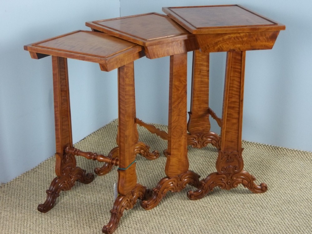 A  Regency Georgian Gillows nest or set trio of stacking three satinwood sofa lamp side occasional low coffee tables.
C.1820. 