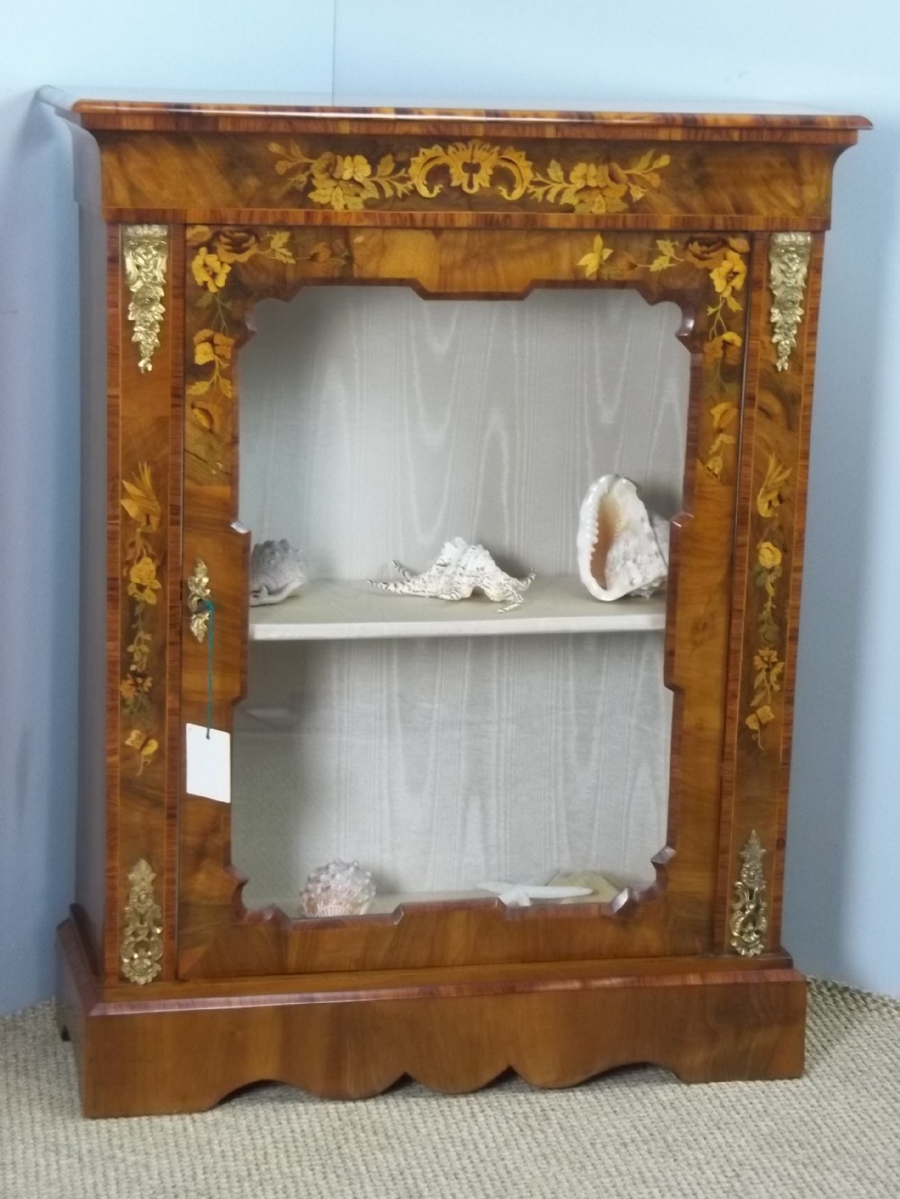 Antique 19th century Victorian walnut marquetry satinwood inlaid pier console vitrine display side narrow cabinet collectors credenza with gilt bronze mounts. C.1860.
