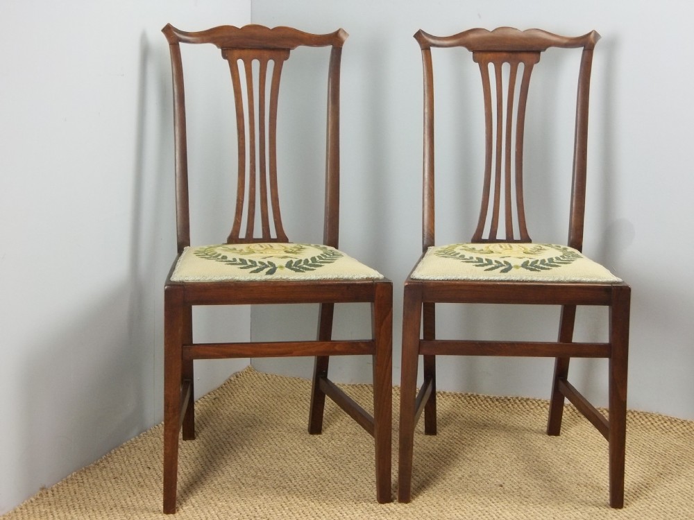 A pair of Edwardian hand stitched tapestry upholstered mahogany stained hardwood desk hall side bedroom salon chairs. C.1900.
