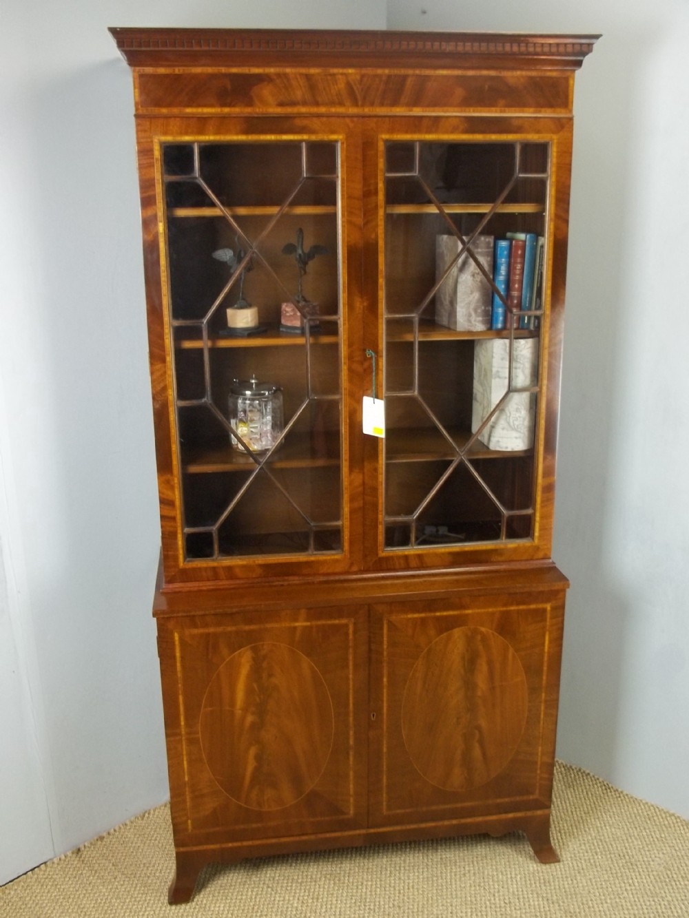 Antique mahogany and satinwood cross banded small bookcase cupboard display Sheraton  line inlaid cabinet  