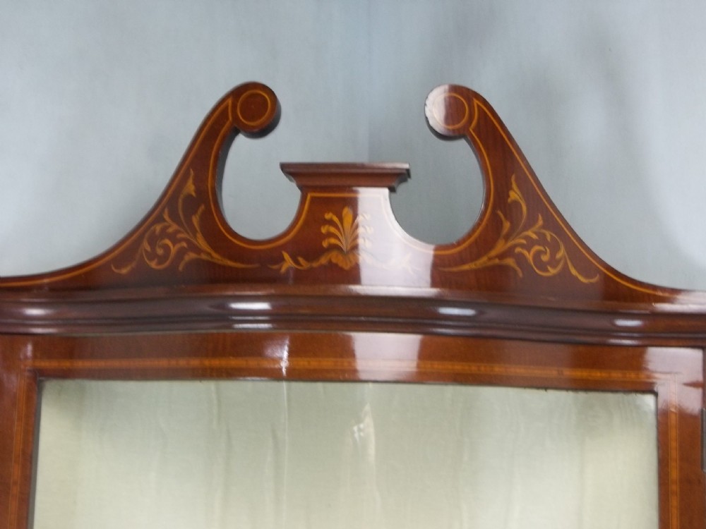 Antique Edwards and Roberts mahogany marquetry inlaid serpentine fronted corner double height standing corner display cabinet cupboard. C.1900 View V