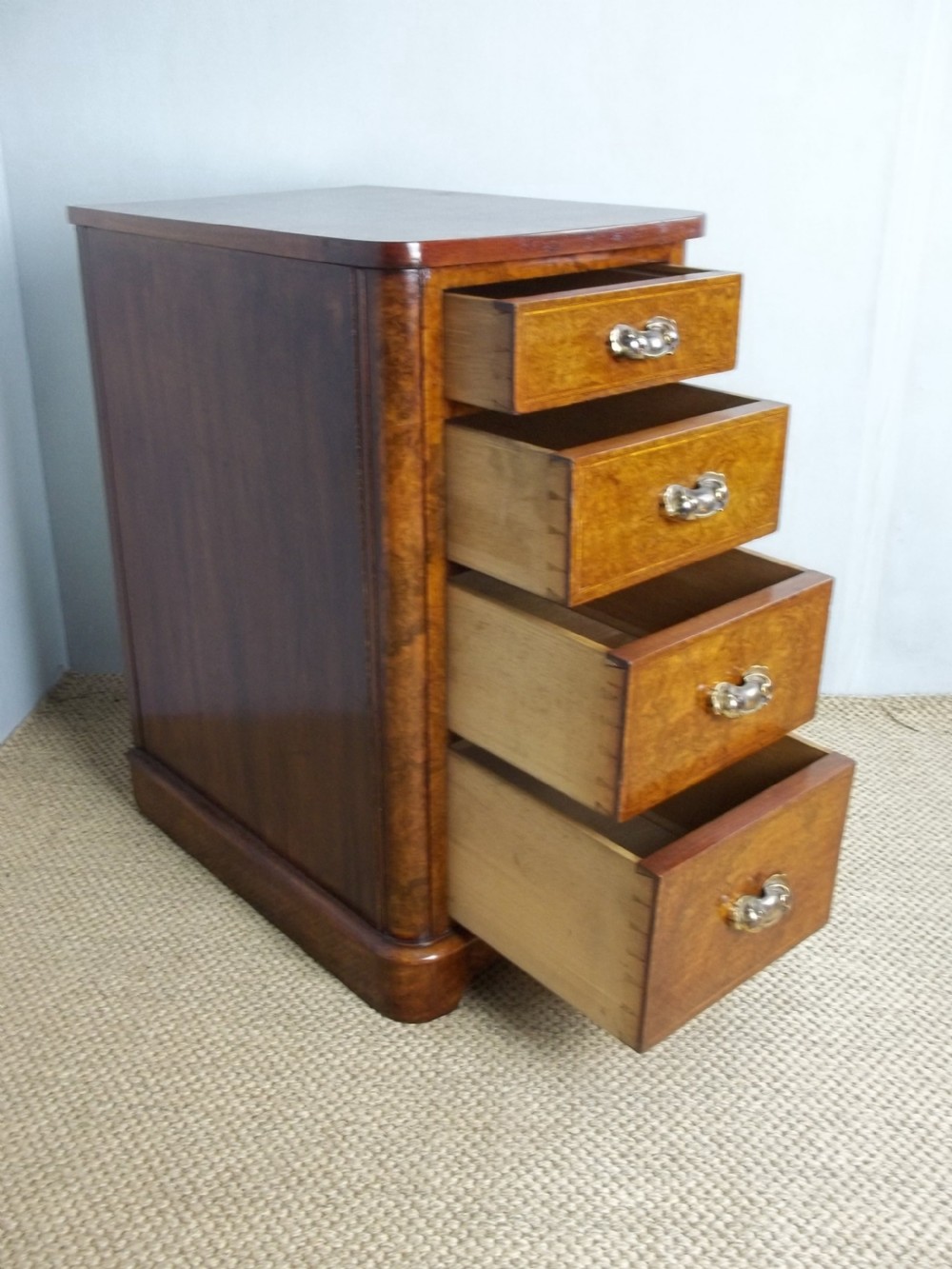 A pair of 19th century burr walnut and inlaid bedside cabinet chests or chest of drawers. C.1870 View III