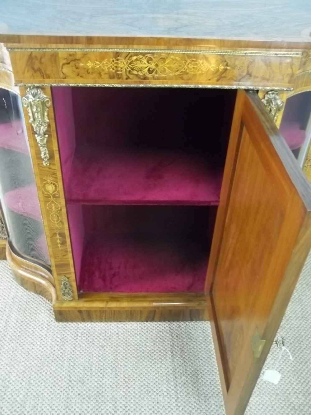 Antique 19th century serpentine shaped figured walnut inlaid ormolu mounted small narrow credenza display side pier sideboard cabinet . C.1860. View VII