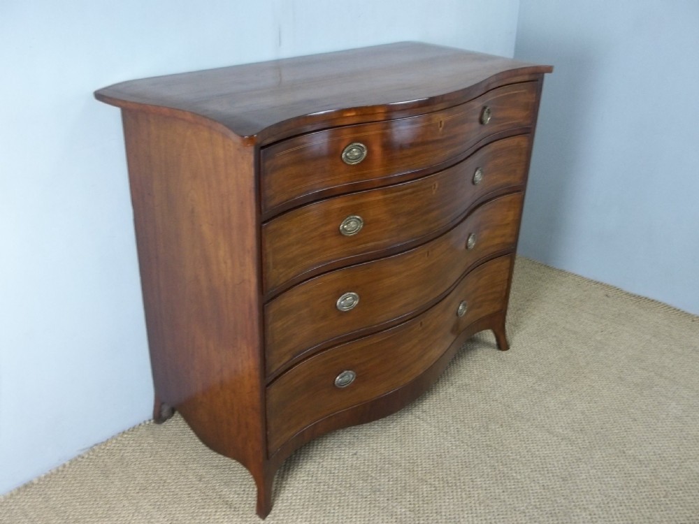 Antique 18th century George III Georgian mahogany inlaid serpentine shaped Hepplewhite  chest of drawers commode. C.1790 