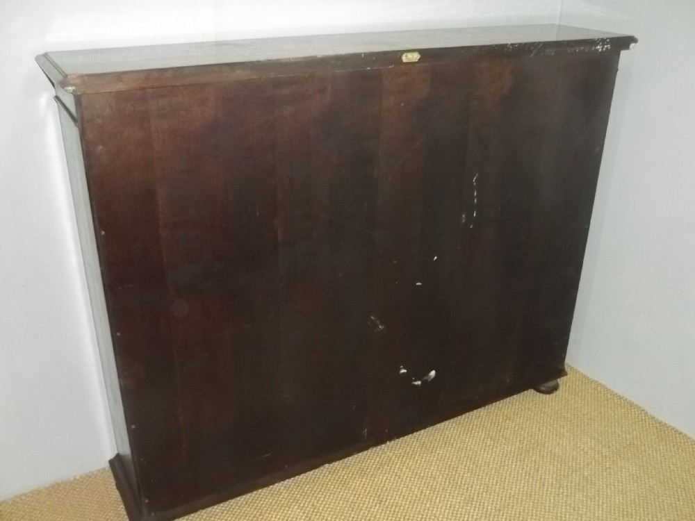 Solid oak bookshelf stamped Waring and Gillows late 19th/early 20th open set of adjustable bookshelves bookcase.C.1900 View VII