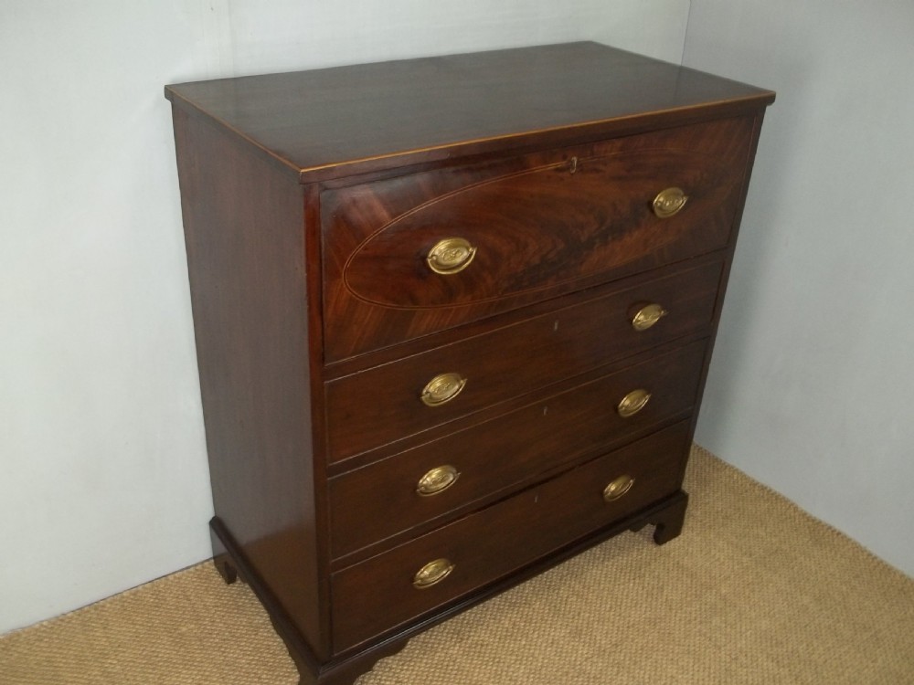 A delightful small antique Sheraton period Regency mahogany inlaid oak lined secretaire chest of drawers writing table desk bureau.