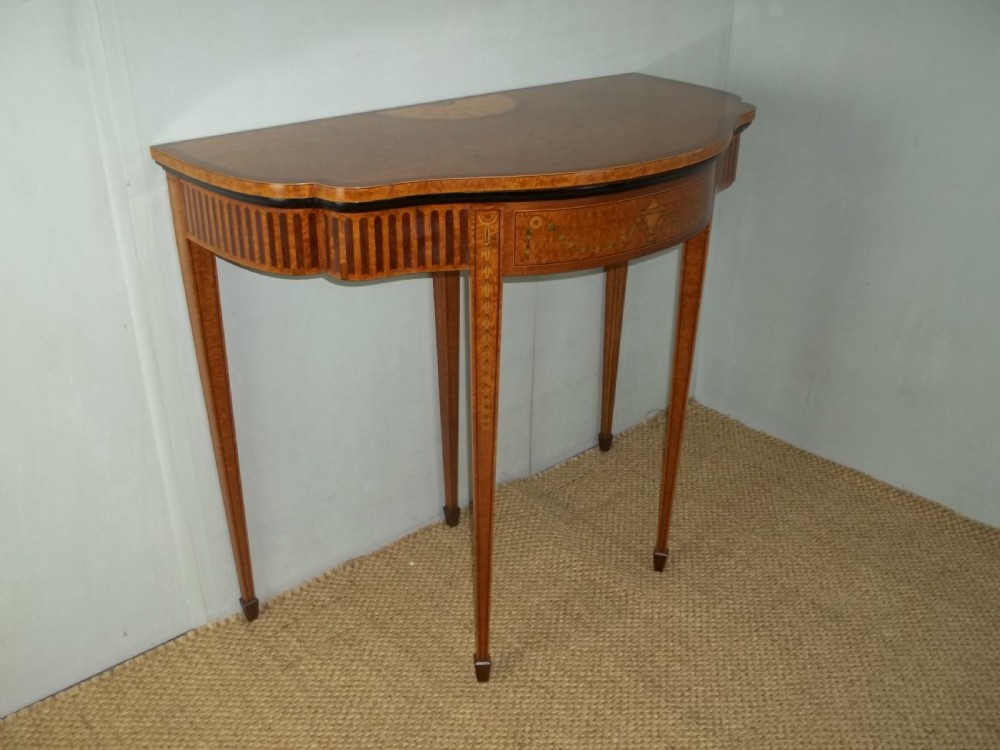 A stunning Sheraton Regency design  serpentine fronted marquetry inlaid satinwood card games side hall lamp occasional table. C.1895 View II