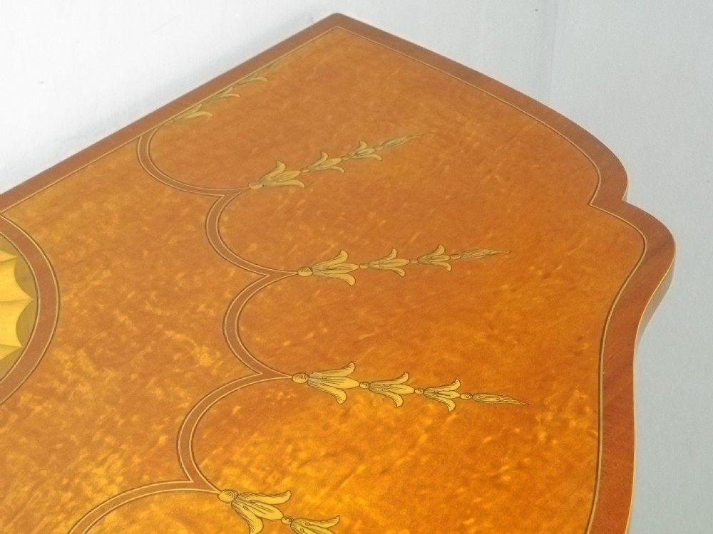 A stunning Sheraton Regency design  serpentine fronted marquetry inlaid satinwood card games side hall lamp occasional table. C.1895 View IV