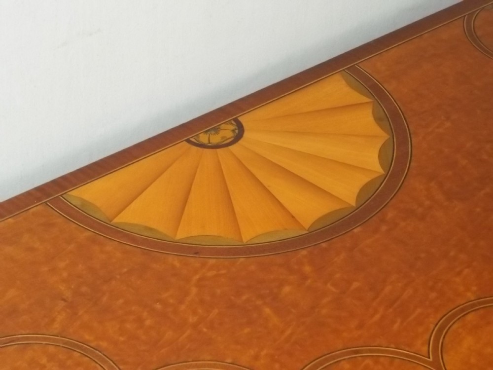 A stunning Sheraton Regency design  serpentine fronted marquetry inlaid satinwood card games side hall lamp occasional table. C.1895 View V