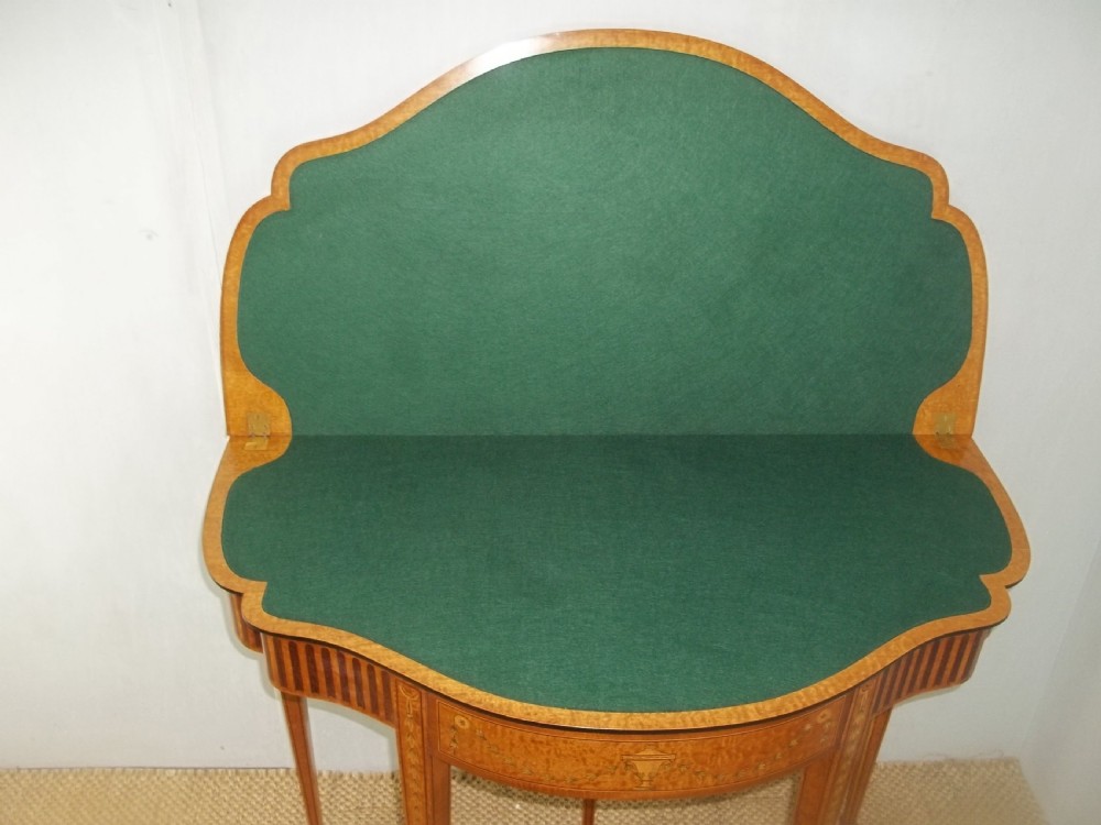 A stunning Sheraton Regency design  serpentine fronted marquetry inlaid satinwood card games side hall lamp occasional table. C.1895 View VIII
