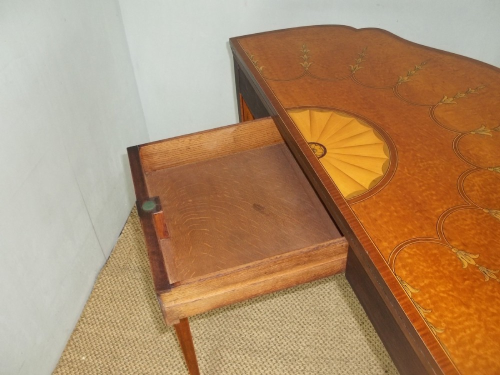 A stunning Sheraton Regency design  serpentine fronted marquetry inlaid satinwood card games side hall lamp occasional table. C.1895 View XI