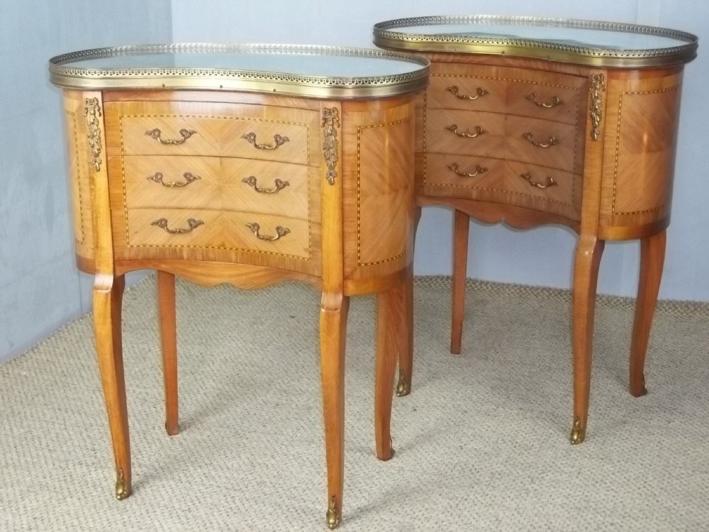 A pair of antique walnut French  inlaid bedside lamp chests with flat marble table top and gilt bronze ormolu mounts