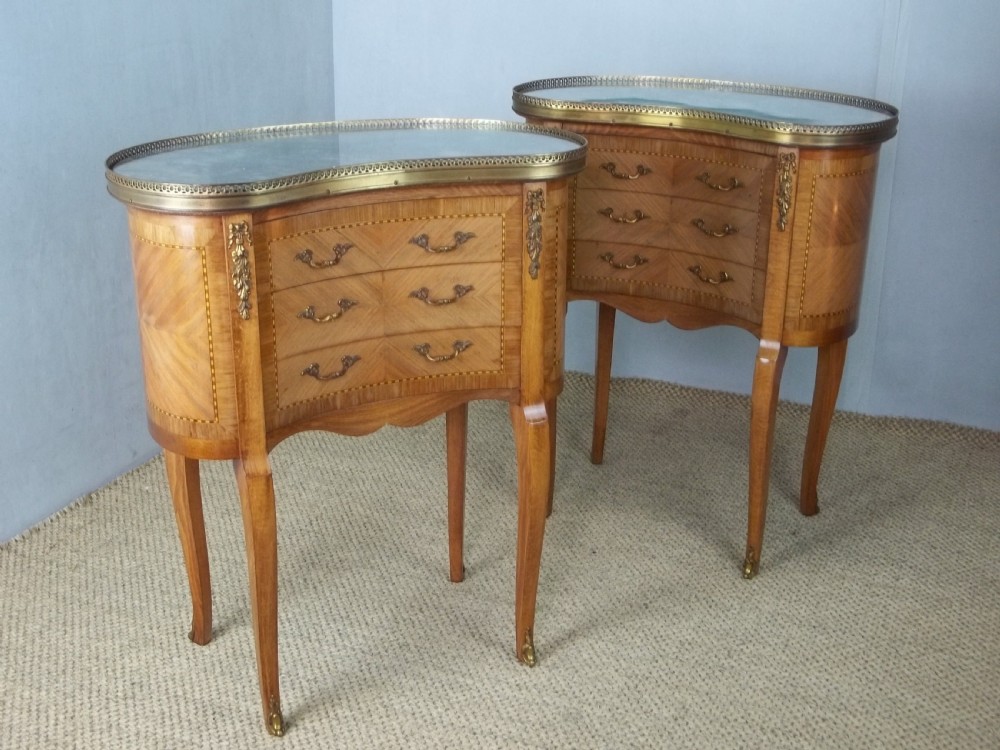A pair of antique walnut French  inlaid bedside lamp chests with flat marble table top and gilt bronze ormolu mounts View II