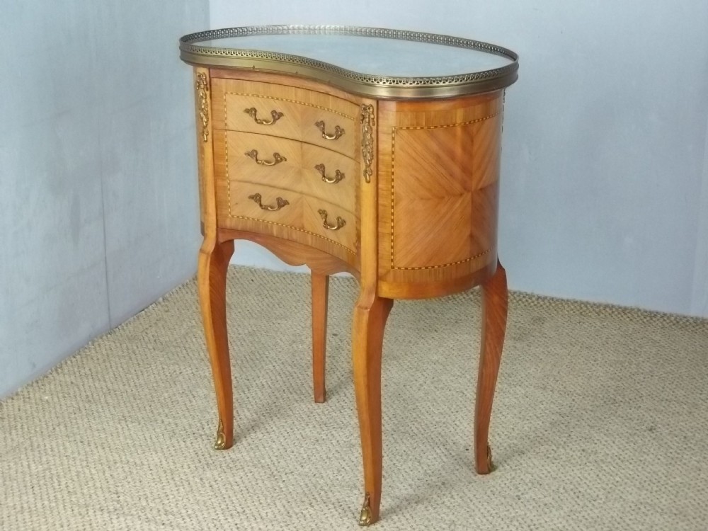 A pair of antique walnut French  inlaid bedside lamp chests with flat marble table top and gilt bronze ormolu mounts View III