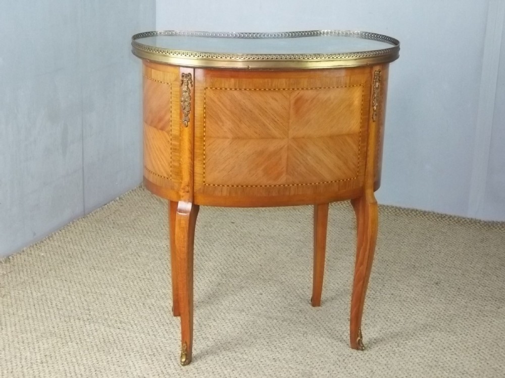 A pair of antique walnut French  inlaid bedside lamp chests with flat marble table top and gilt bronze ormolu mounts View IV