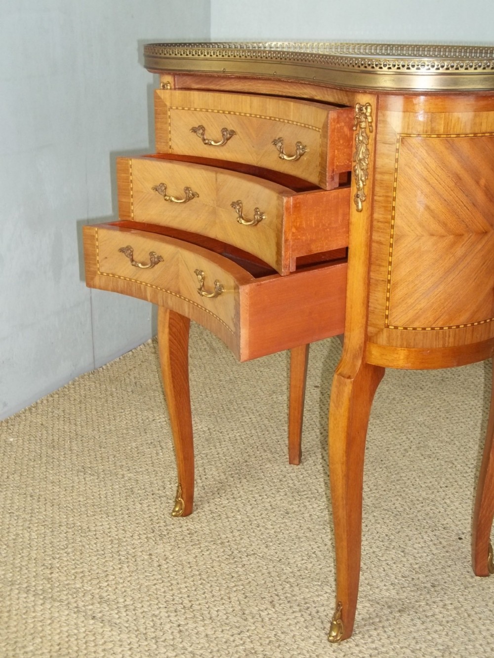 A pair of antique walnut French  inlaid bedside lamp chests with flat marble table top and gilt bronze ormolu mounts View VII
