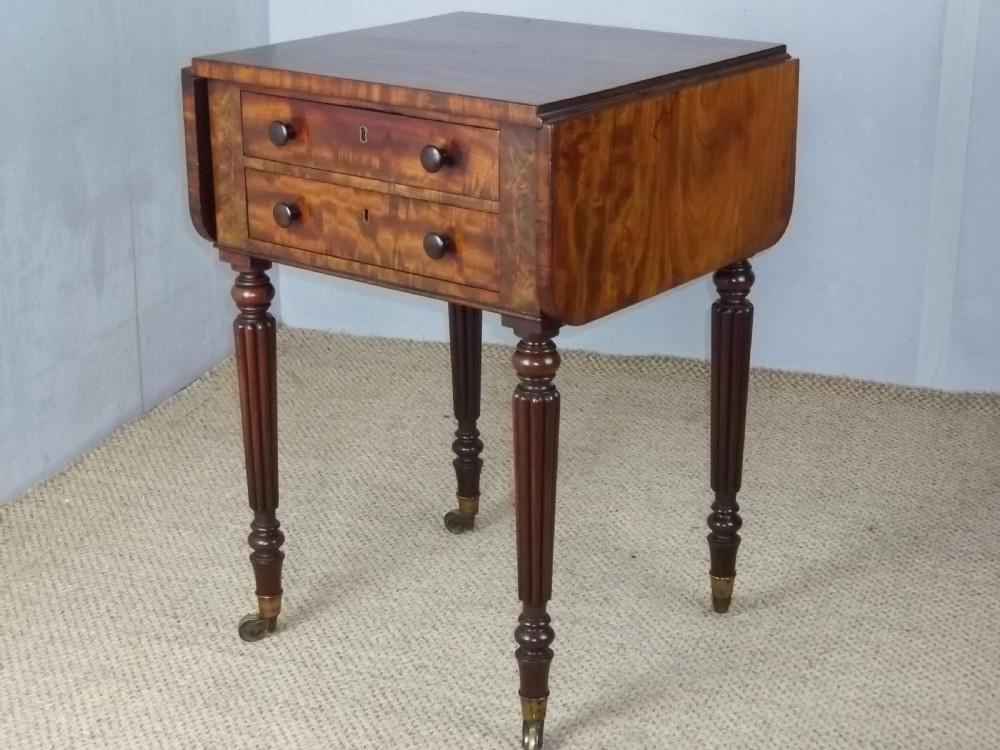 A Regency Gillows small mahogany drop leaf Pembroke lamp works table