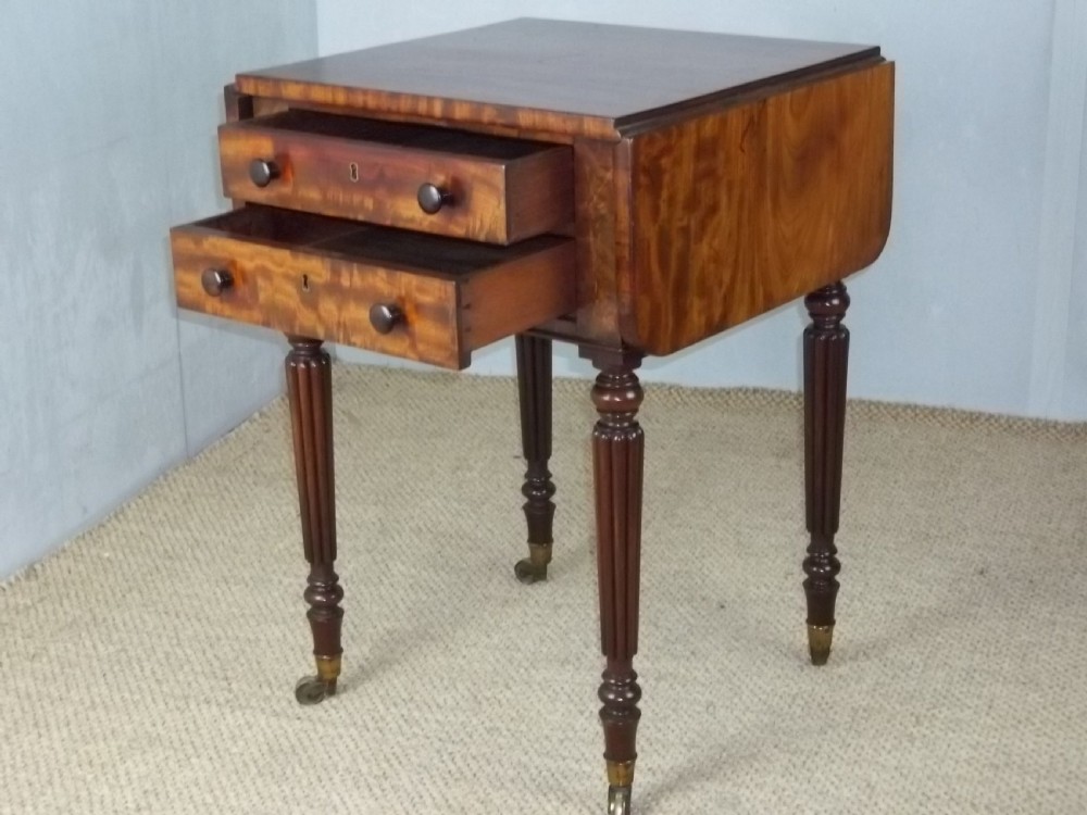 A Regency Gillows small mahogany drop leaf Pembroke lamp works table View II