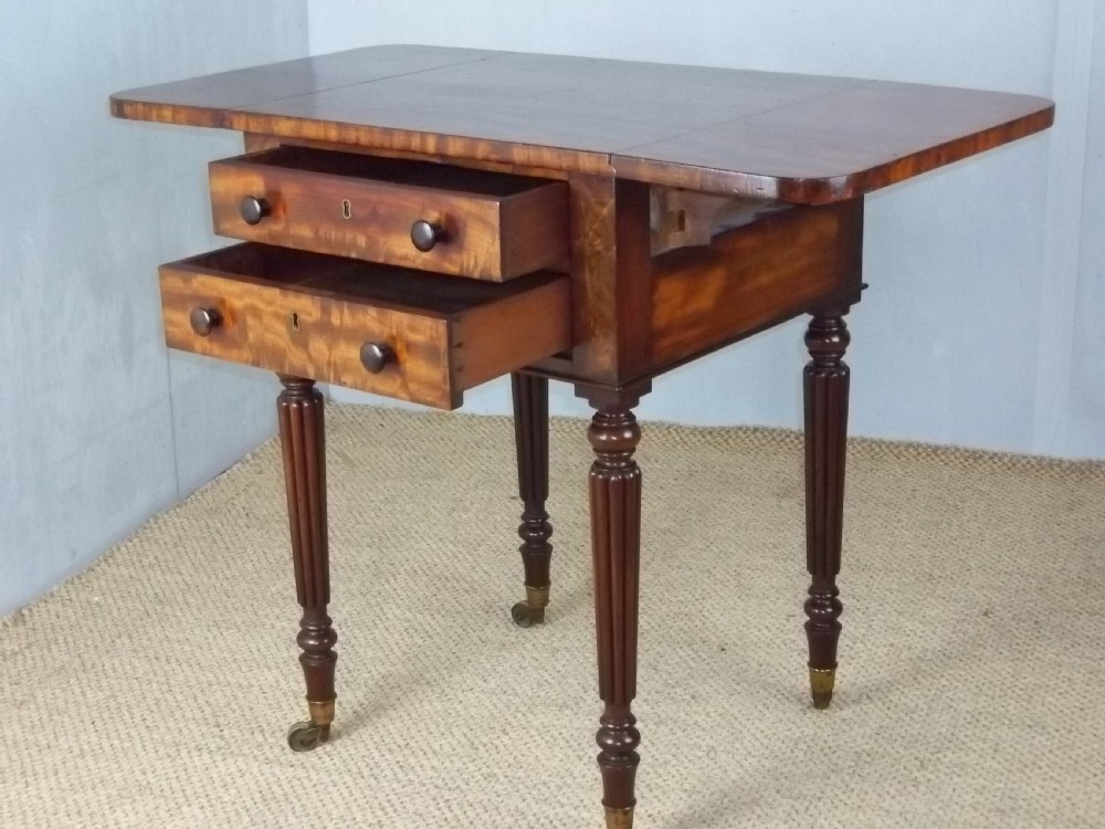 A Regency Gillows small mahogany drop leaf Pembroke lamp works table View III