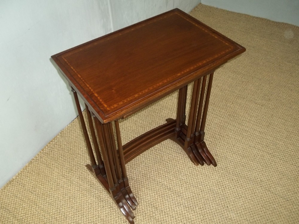 Antique quartetto nest of four mahogany and satinwood inlaid coffee side wine sofa stacking tables View V