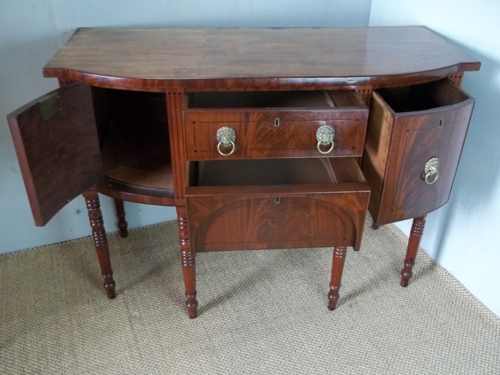Superb quality Georgian small Regency mahogany bowfront inlaid sideboard serving table of bow break front in the manner of George Oakley. C1810. View II