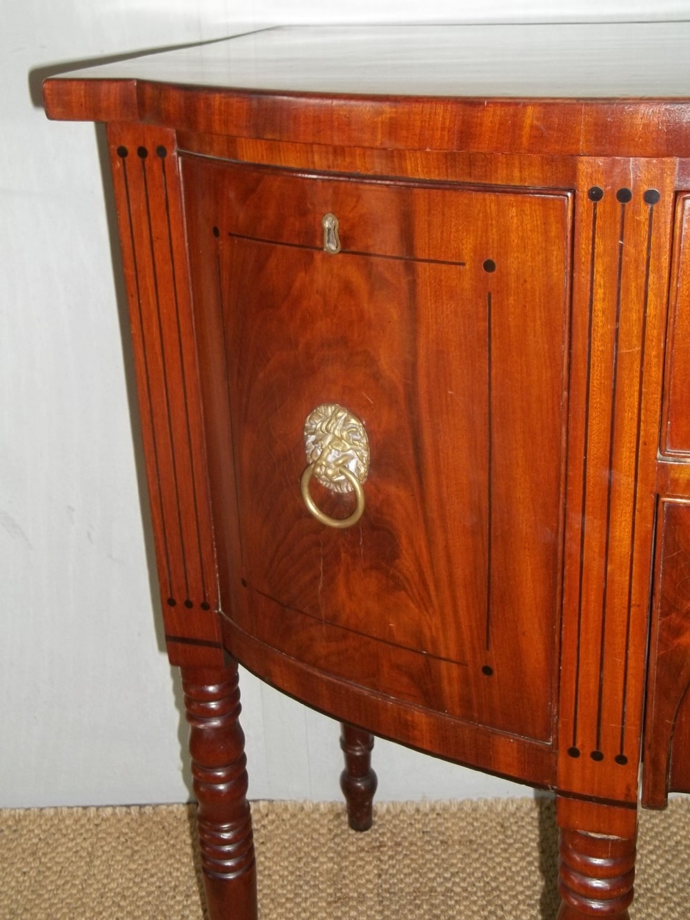 Superb quality Georgian small Regency mahogany bowfront inlaid sideboard serving table of bow break front in the manner of George Oakley. C1810. View III