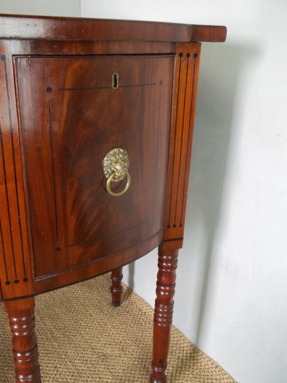 Superb quality Georgian small Regency mahogany bowfront inlaid sideboard serving table of bow break front in the manner of George Oakley. C1810. View IV