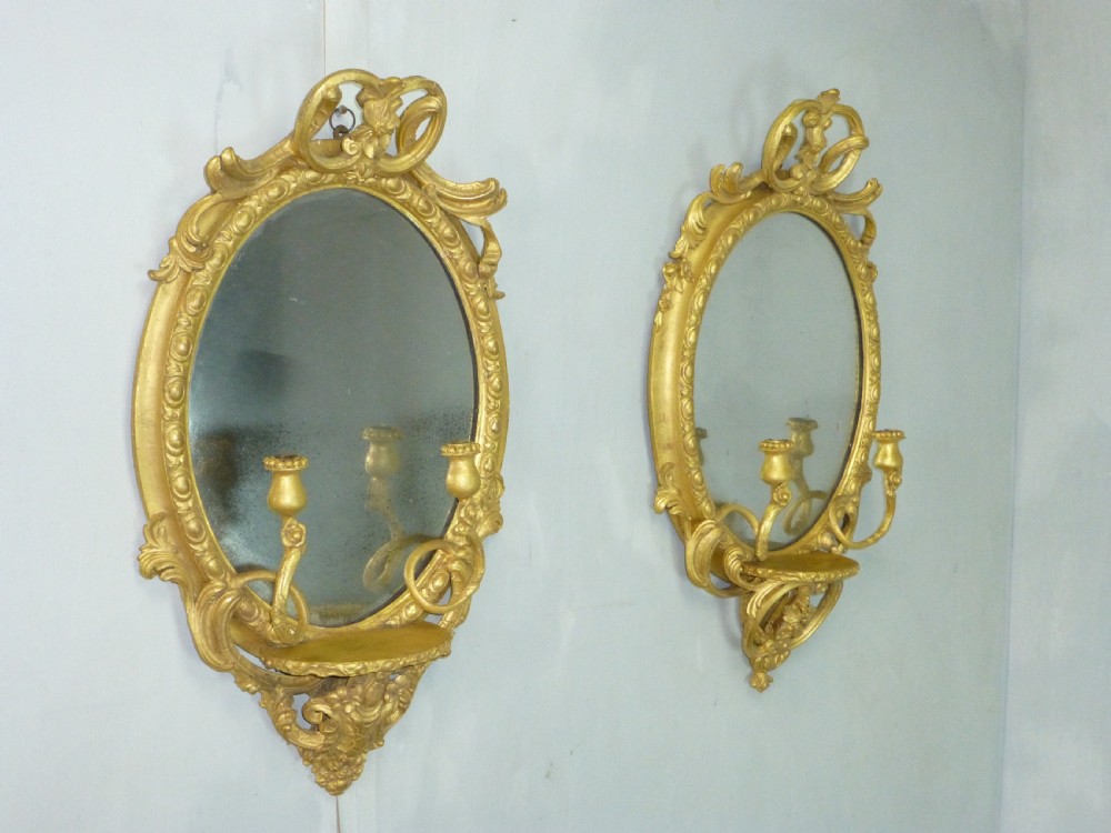 pair of gilt wood looking glass pier gilded oval giltwood wall girandole mirrors