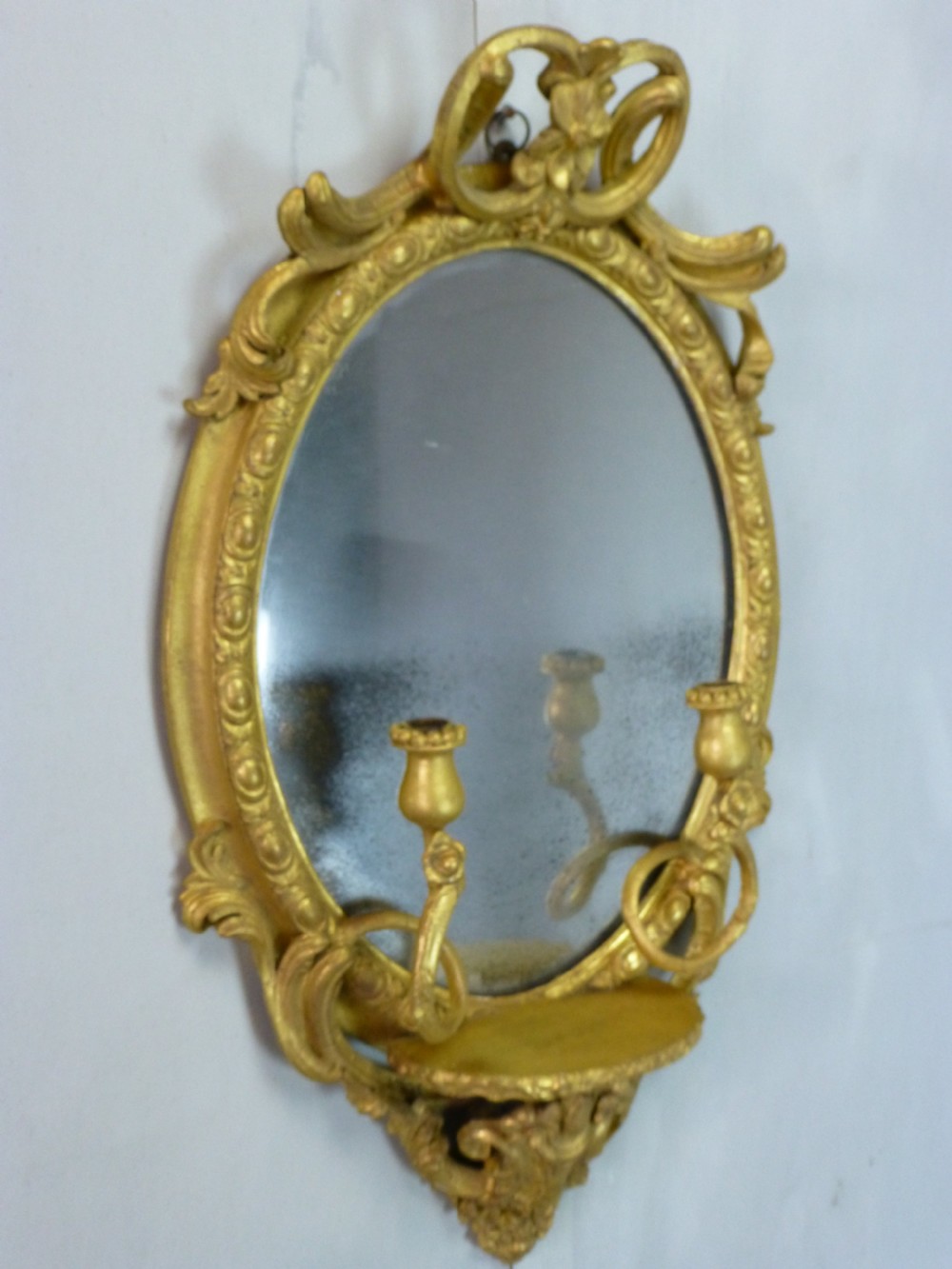Antique 19th century English gilt girandole oval wall  looking glass mirror. C1860 View II