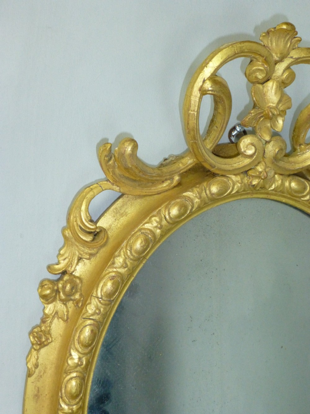 Antique 19th century English gilt girandole oval wall  looking glass mirror. C1860 View V