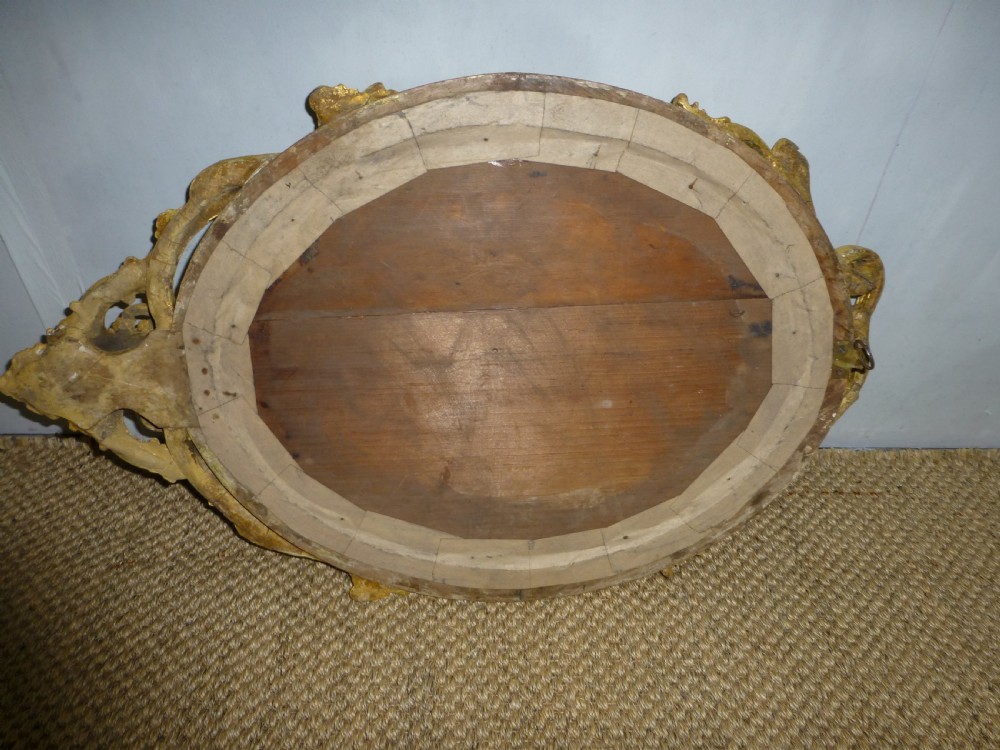 Antique 19th century English gilt girandole oval wall  looking glass mirror. C1860 View VI