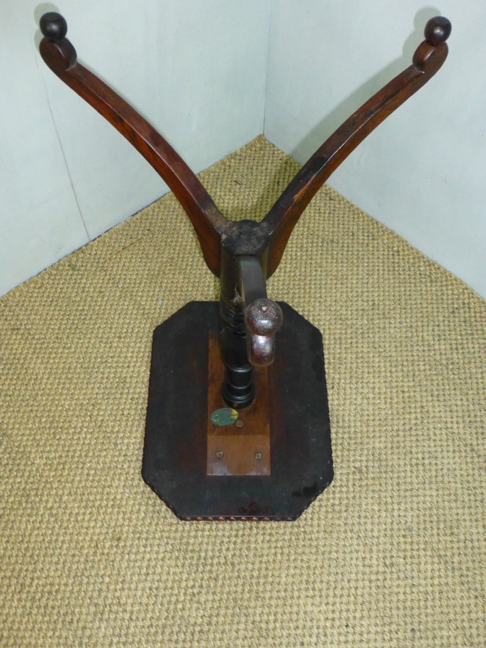 A Regency era rosewood occasional wine table featuring an octagonal top with beaded edging, a turned central pedestal, and three downswept tripod legs. View VII