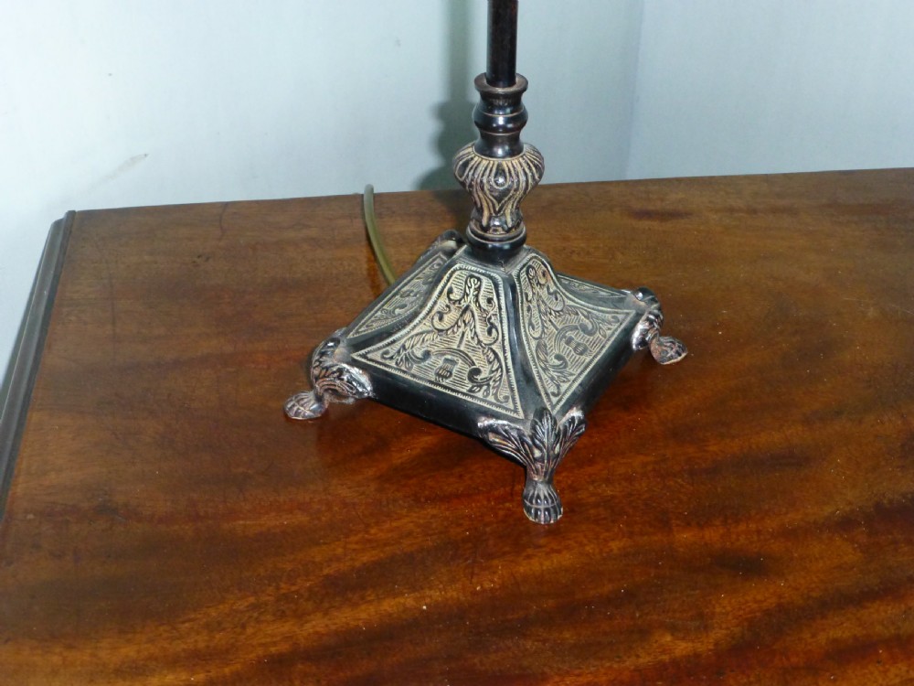 A pair of early 20th century bronzed table lamps View IV