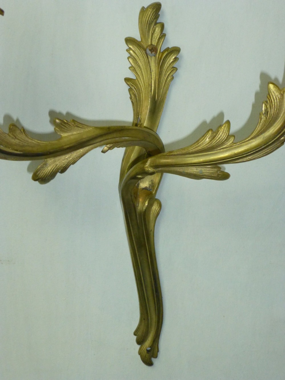 A pair of rococo gilt brass wall light sconces. View V