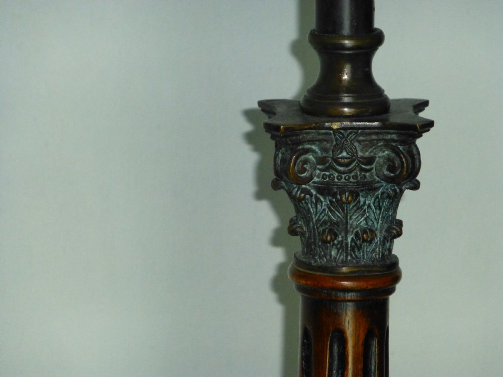 A fabulous pair of large bronze and walnut table lamps. C1920 View III