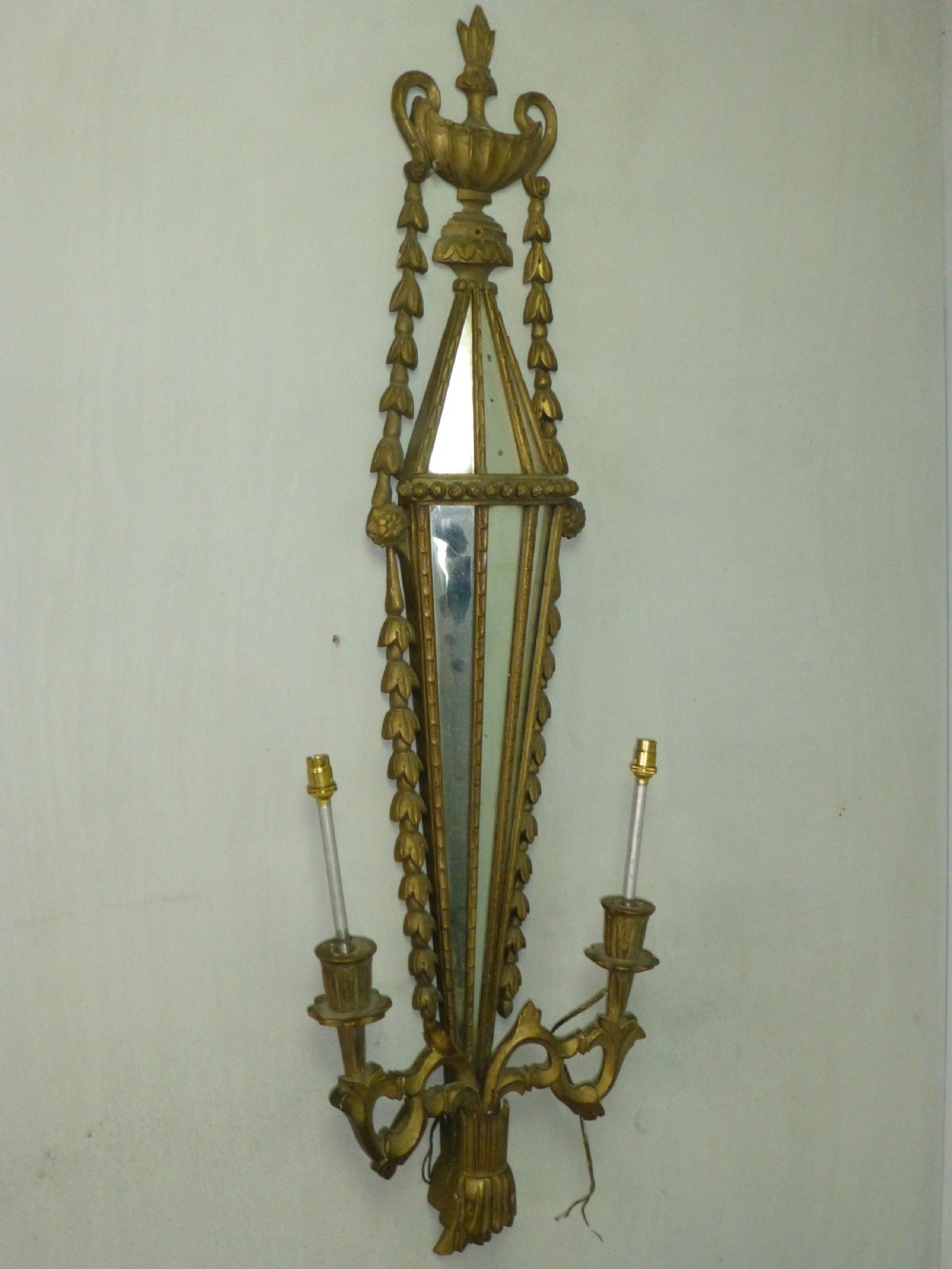 a large carved giltwood wall light sconce. C1920.