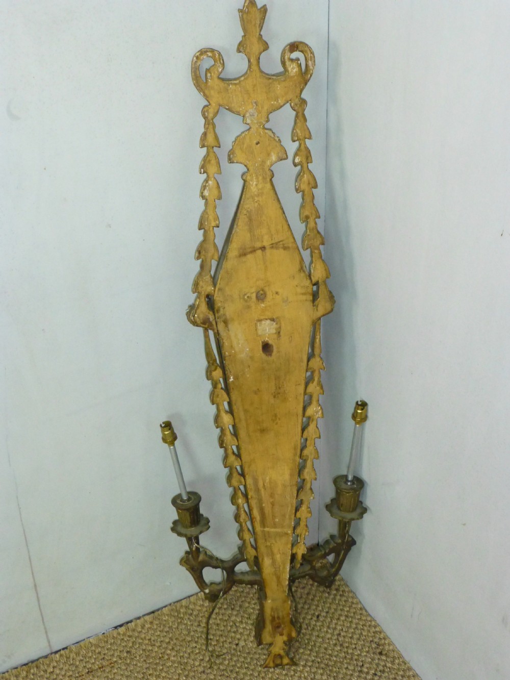a large carved giltwood wall light sconce. C1920. View IV