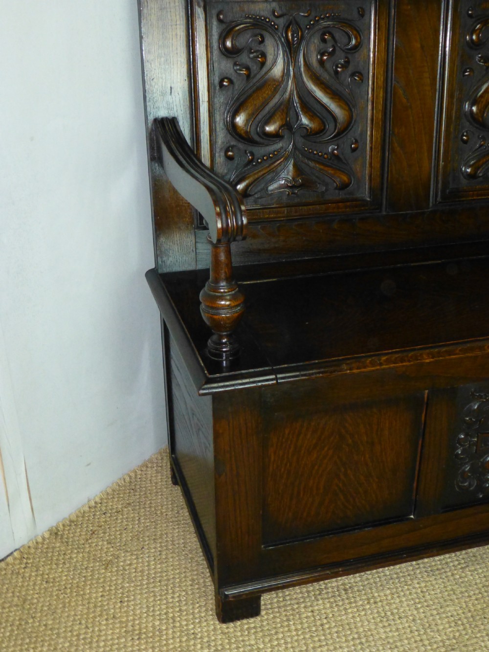 A stunning quality small Art Nouveau oak box settle hall bench. C 1890. View II