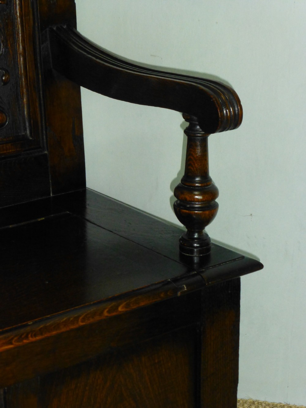 A stunning quality small Art Nouveau oak box settle hall bench. C 1890. View III