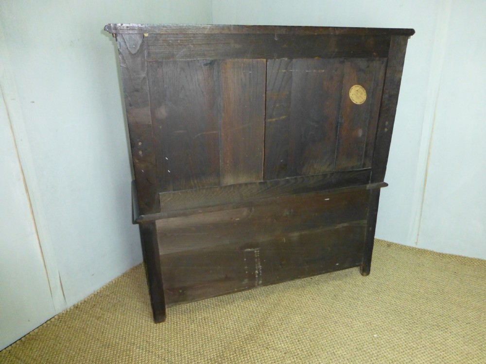 A stunning quality small Art Nouveau oak box settle hall bench. C 1890. View VI