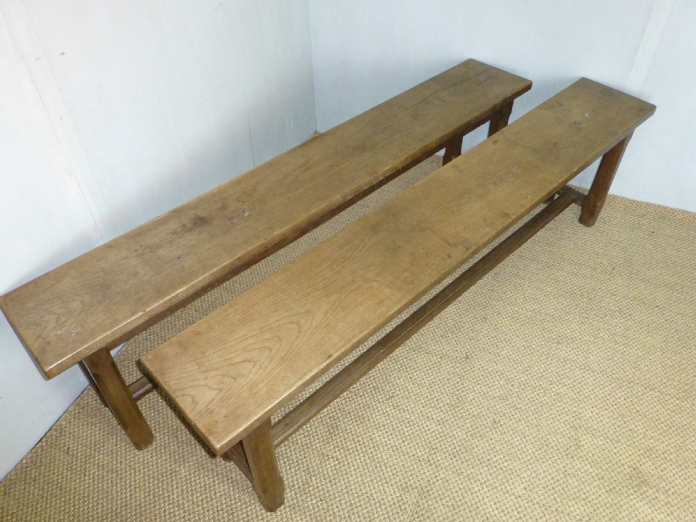 Fabulous pair of trestle design 19th century oak benches. Circa 1870. View III