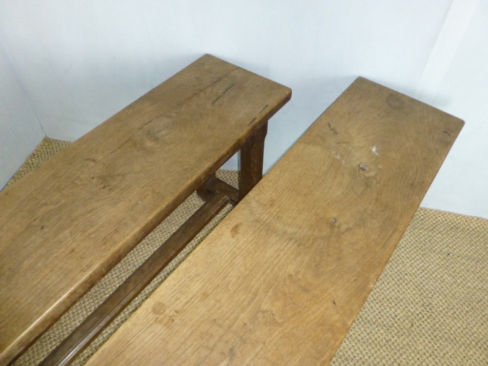 Fabulous pair of trestle design 19th century oak benches. Circa 1870. View IV